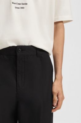 Relaxed-fit trousers in a cotton blend, Black