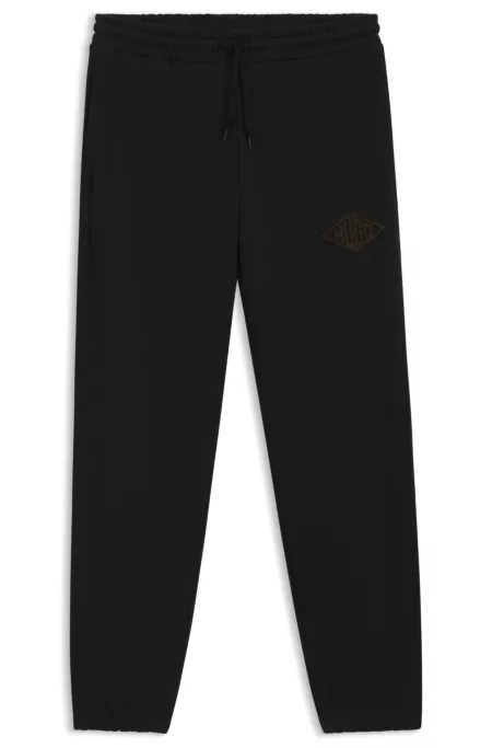 Cotton-terry tracksuit bottoms with embroidered logo