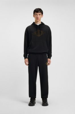 Cotton-terry tracksuit bottoms with embroidered logo, Black