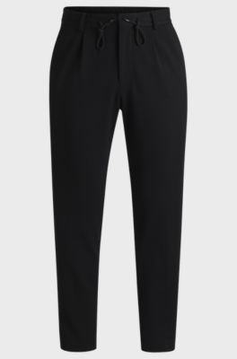 Dressletic tapered-fit trousers in performance-stretch fabric, Black