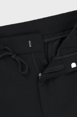 Dressletic tapered-fit trousers in performance-stretch fabric, Black