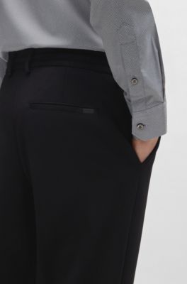 Dressletic tapered-fit trousers in performance-stretch fabric, Black
