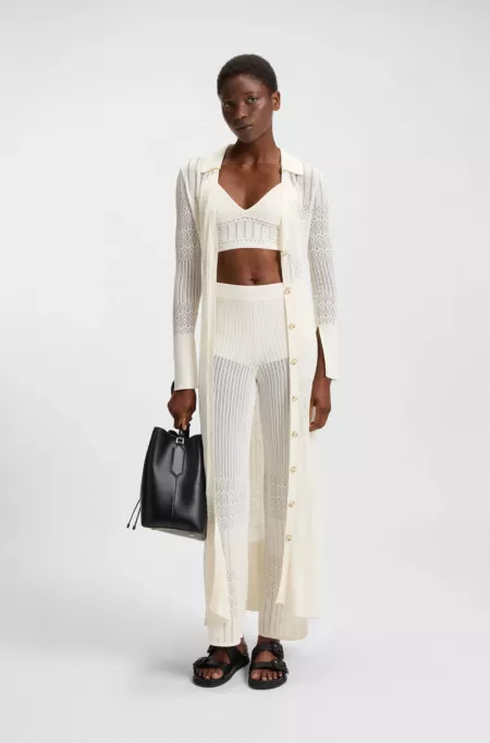 Knitted trousers in stretch fabric with mixed structures