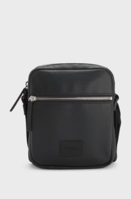 Reporter-Tasche mit Logo-Aufn&auml;her, Schwarz