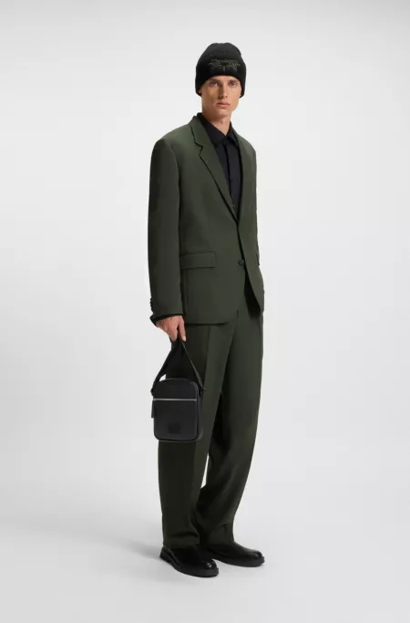 Grained faux-leather reporter bag with rubber logo patch