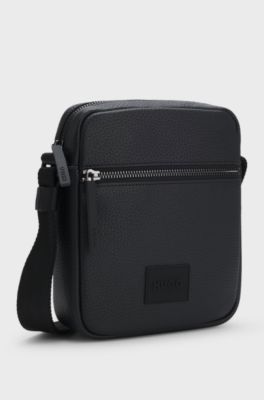 Reporter-Tasche mit Logo-Aufn&auml;her, Schwarz