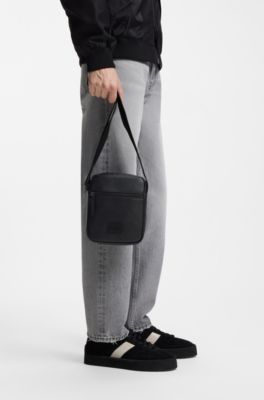 Reporter-Tasche mit Logo-Aufn&auml;her, Schwarz
