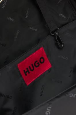 Rucksack mit Rei&szlig;verschluss und Logo-Aufn&auml;her aus Gummi, Schwarz