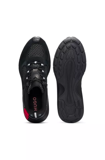 Mixed-material trainers with decorative reflective effects