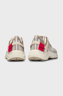 Mixed-material trainers with decorative reflective effects, Beige