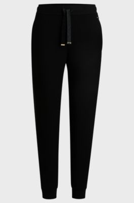 Monogram-detailed tracksuit bottoms with modal and silk, Black