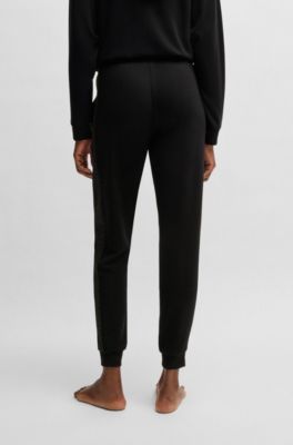 Monogram-detailed tracksuit bottoms with modal and silk, Black