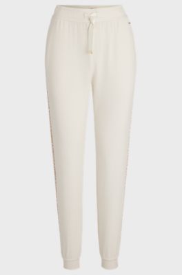 Monogram-detailed tracksuit bottoms with modal and silk, Natural