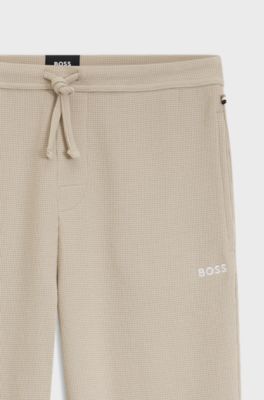 Cotton-blend pyjama bottoms with embroidered logo, Light Beige