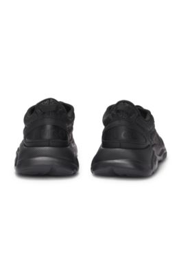 Mixed-material trainers with monogrammed uppers and EVA outsole, Black