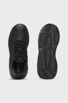 Mixed-material trainers with monogrammed uppers and EVA outsole, Black