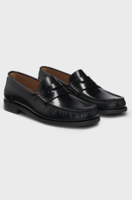 Penny-trim loafers in brush-off leather, Black