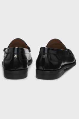 Penny-trim loafers in brush-off leather, Black