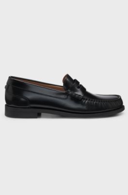 Penny-trim loafers in brush-off leather, Black