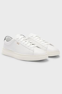 Lace-up trainers in polished leather with logo details, White