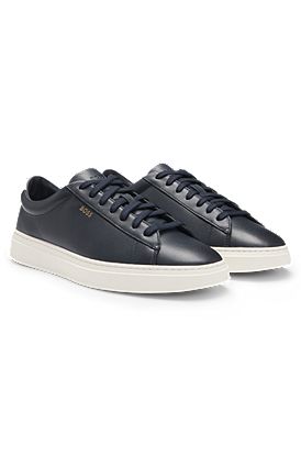 Lace-up trainers in polished leather with logo details