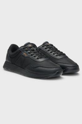 Low-top trainers with textured uppers, Black