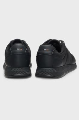 Low-top trainers with textured uppers, Black