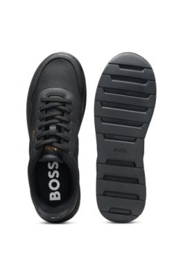 Low-top trainers with textured uppers, Black