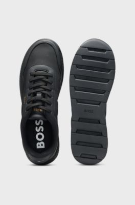 Low-top trainers with textured uppers, Black