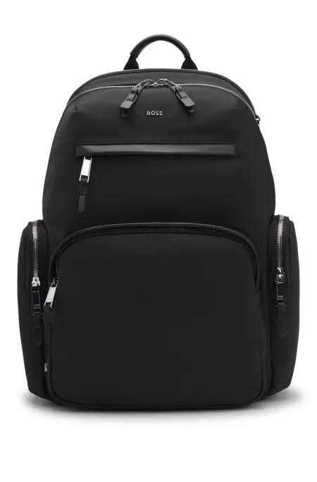 Multi-pocket backpack with leather trims