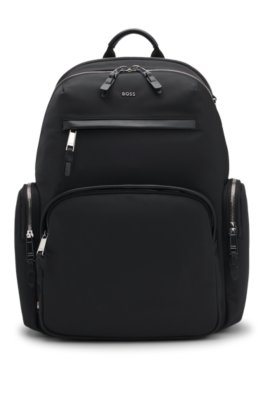Sac à dos avec finitions en cuir et fermeture éclair à double curseur