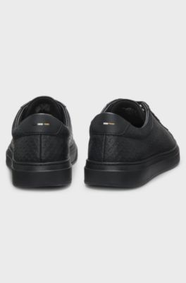 Leather trainers with embossed monograms, Black