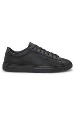 Leather trainers with embossed monograms, Black
