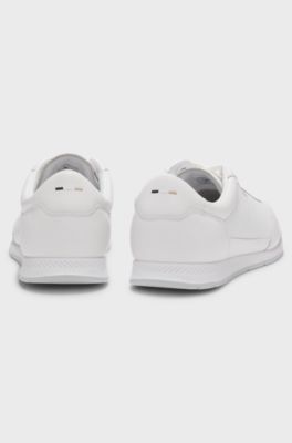 Faux-leather trainers with gold-tone branding, White