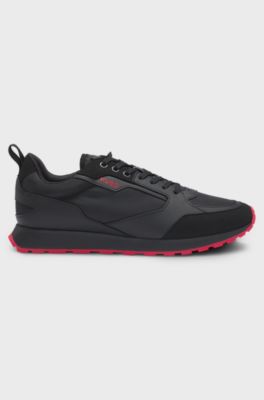 Mixed-material trainers with branded accents, Black