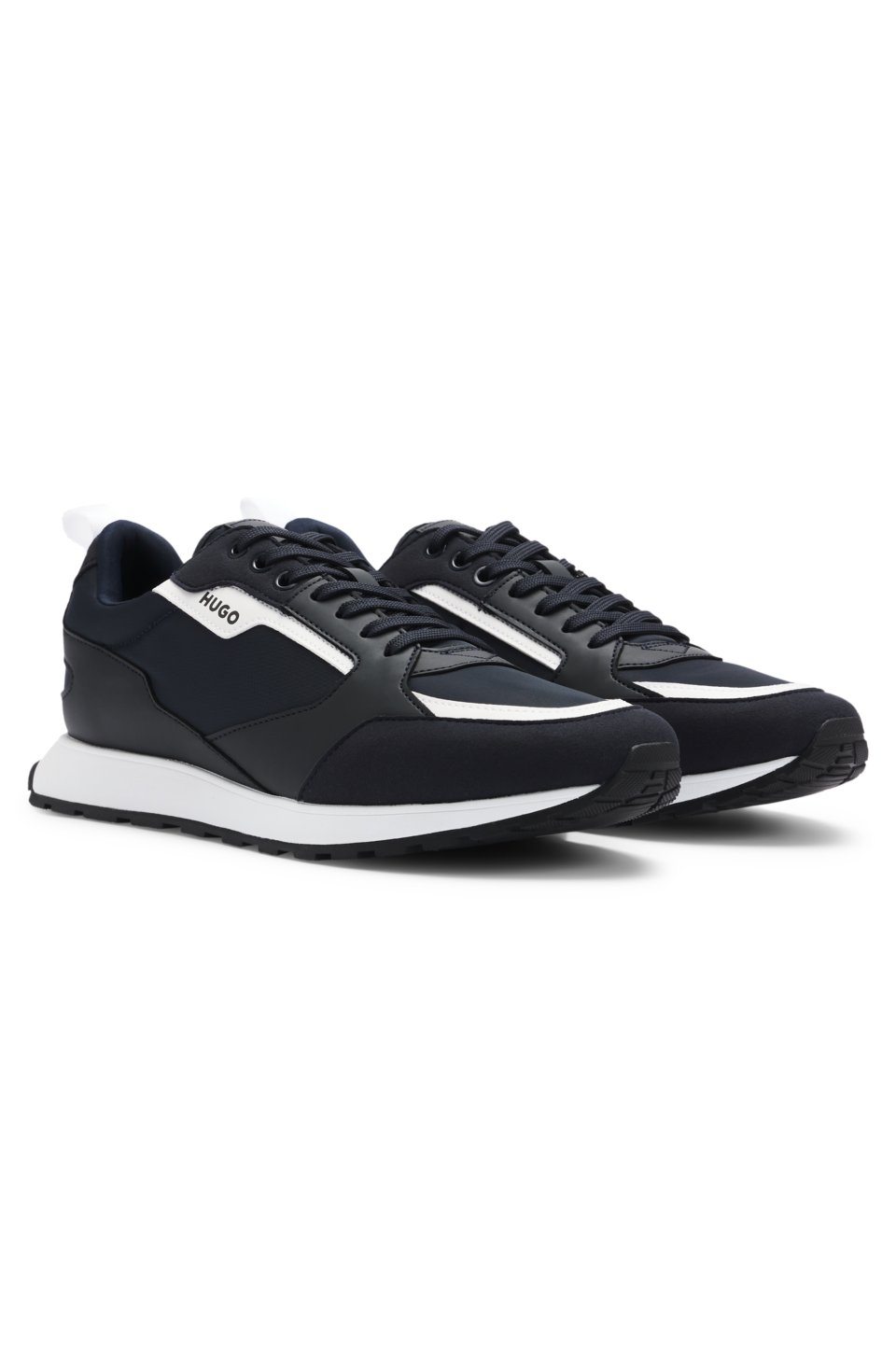 Mixed-material trainers with branded accents