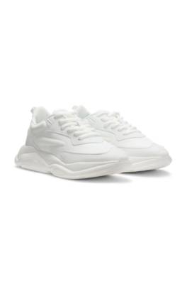 Mixed-material lace-up trainers with counter logo 1