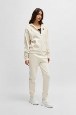 Mixed-material lace-up trainers with counter logo, White