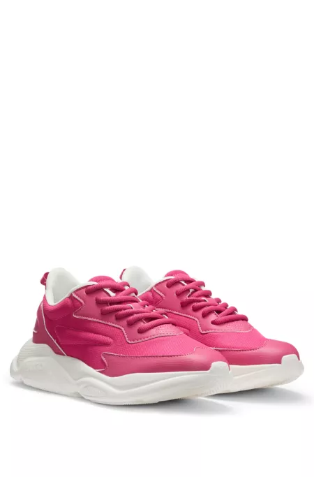 Mixed-material lace-up trainers with counter logo