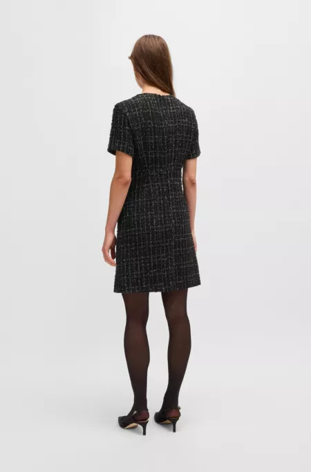 Short-sleeved tweed dress with pocket details