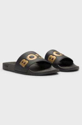 In Itali&euml; vervaardigde slippers met groot logodetail, Zwart