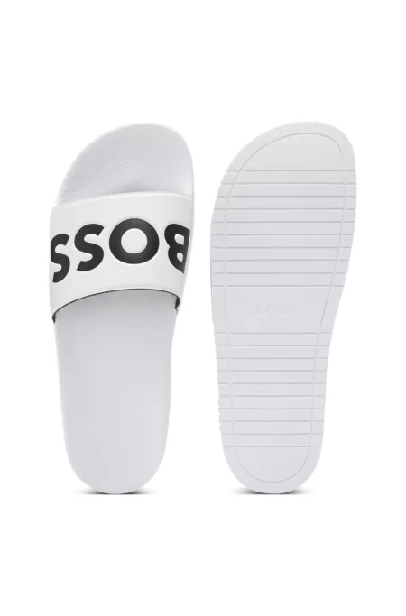 Mules confectionnées en Italie avec grand logo