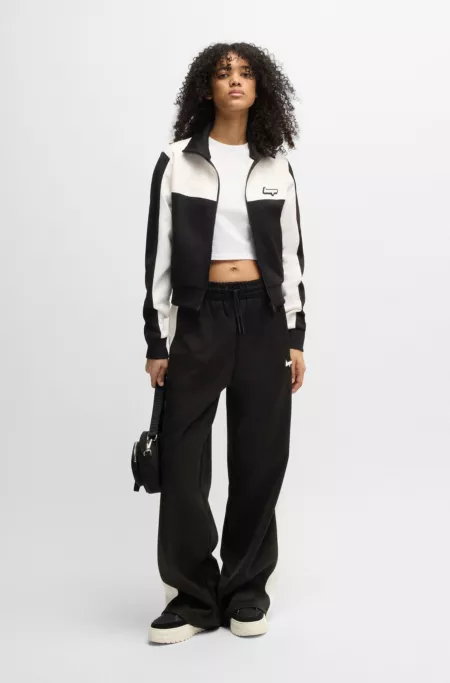 Retro-inspired tracksuit bottoms with side stripe
