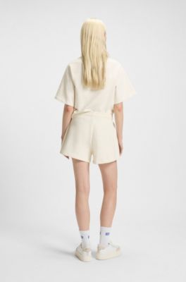 Shorts aus Baumwoll-Terry mit "Happy HUGO"-Logo, Natur