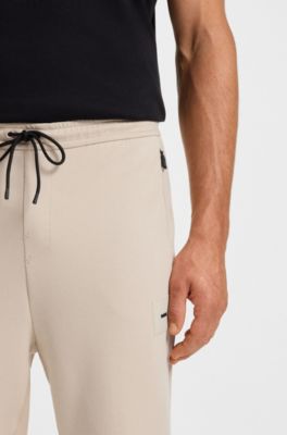 Stretch-cotton-blend tracksuit bottoms with logo patch, Light Beige