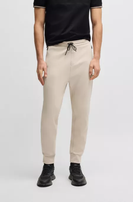 Stretch-cotton-blend tracksuit bottoms with logo patch