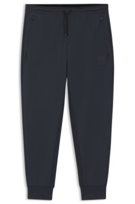 Stretch-cotton-blend tracksuit bottoms with logo patch, Dark Blue
