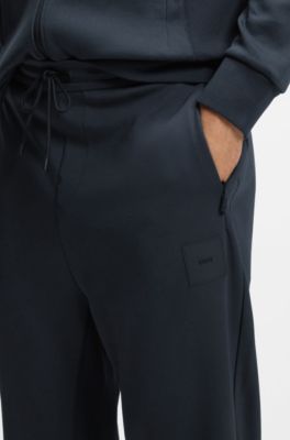 Stretch-cotton-blend tracksuit bottoms with logo patch, Dark Blue