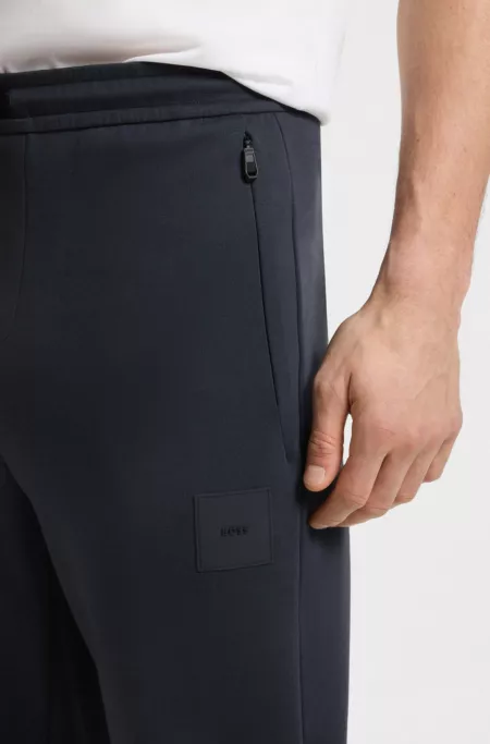 Stretch-cotton-blend tracksuit bottoms with logo patch