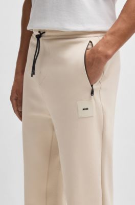 Cotton-blend tracksuit bottoms with stretch, Light Beige